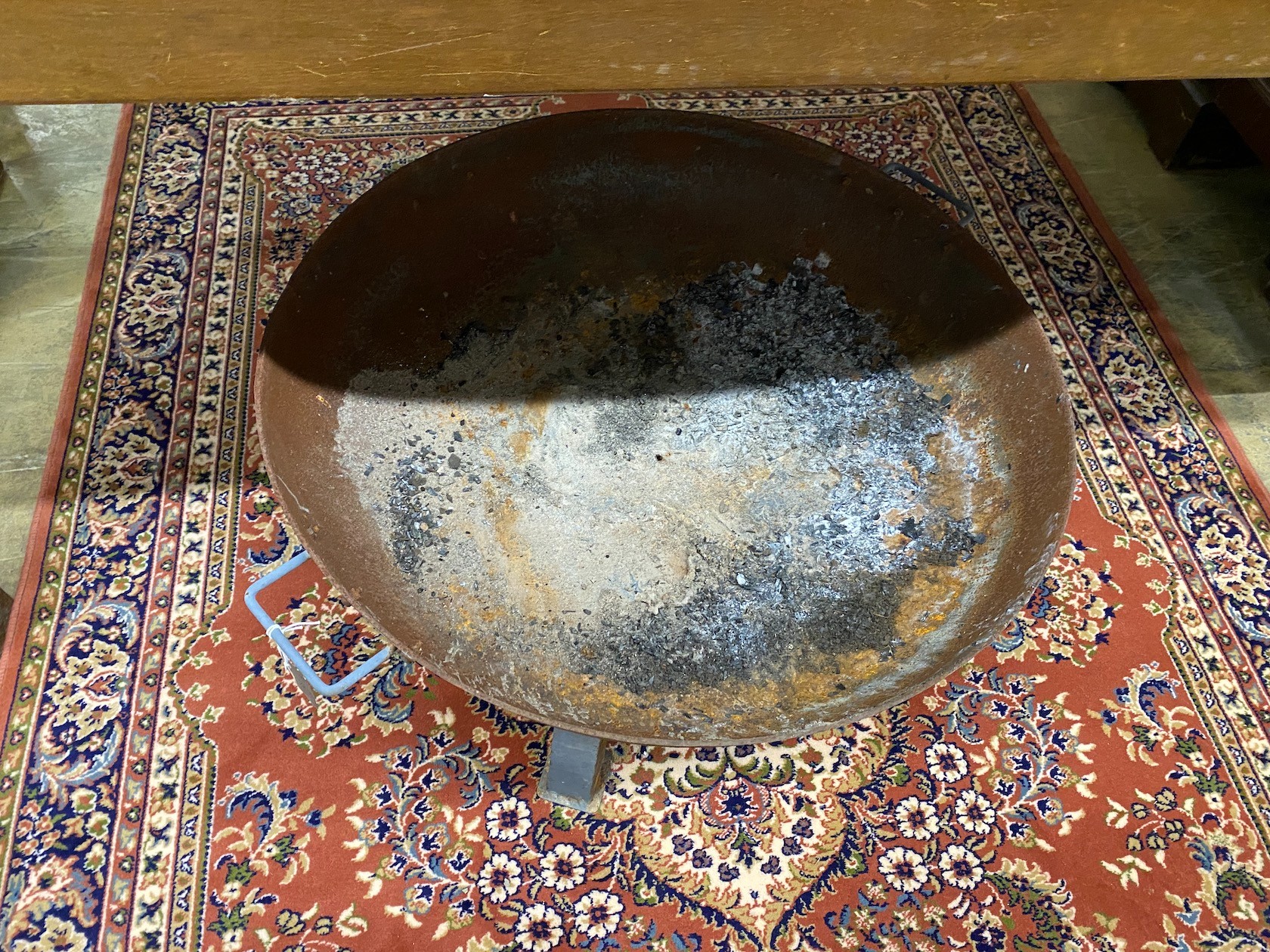 A circular metal firepit, diameter 75cm, height 38cm